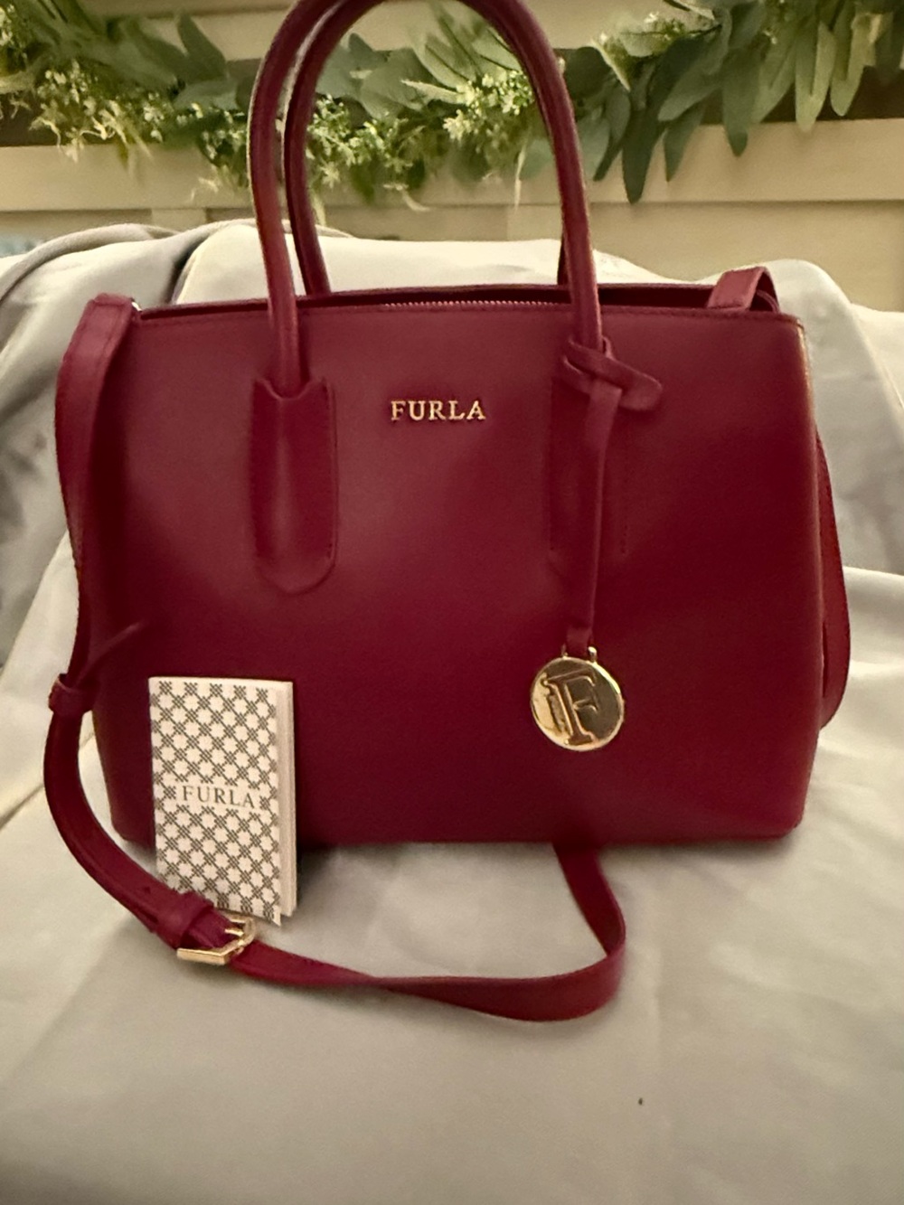 Furla Burgundy Leather Satchel with Gold Accent Charm